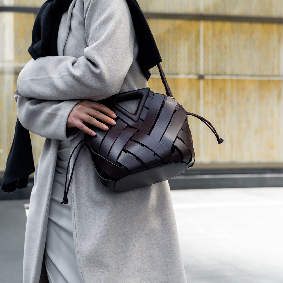 Damen Handtasche mit Flecht-Design und Dreieckshenkel