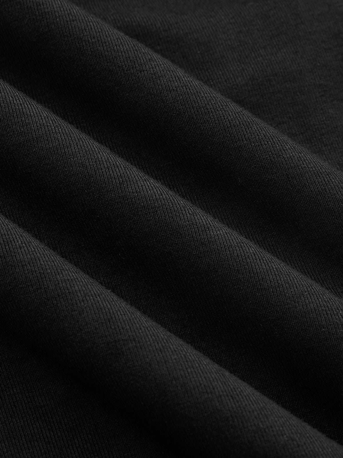 Damen schwarzes geripptes Langarm-Shirt mit asymmetrischem Ausschnitt