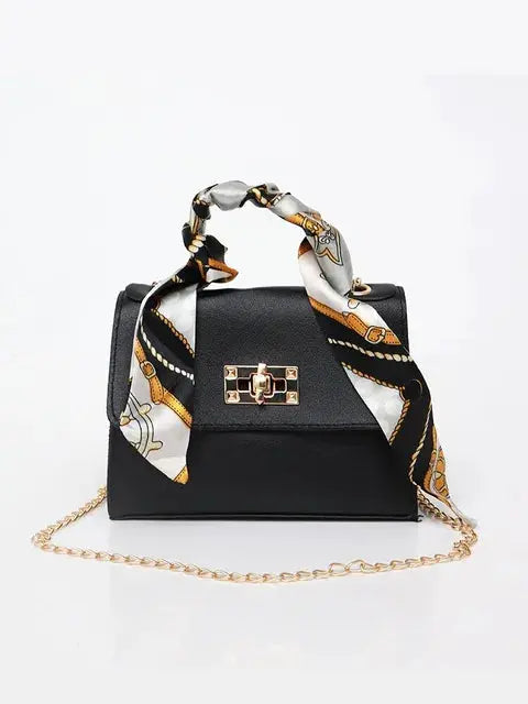 Damen Lederhandtasche mit Goldverschluss
